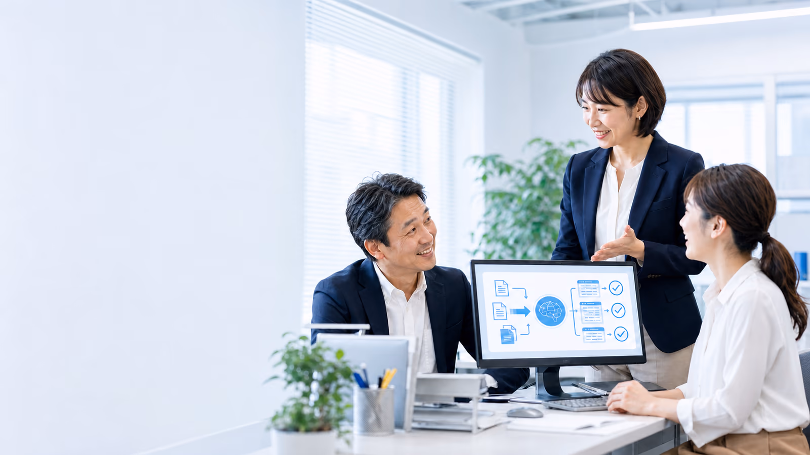 補助金を活用したAI業務システム導入について打ち合わせるチーム